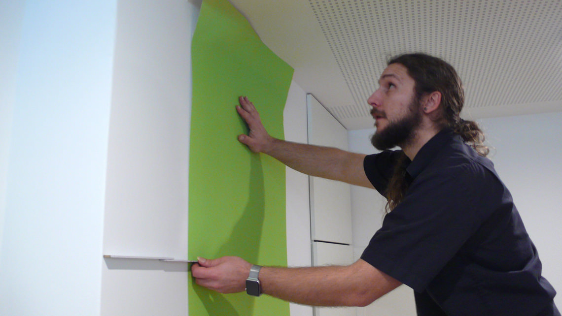 Wallpaper and logo as adhesive film