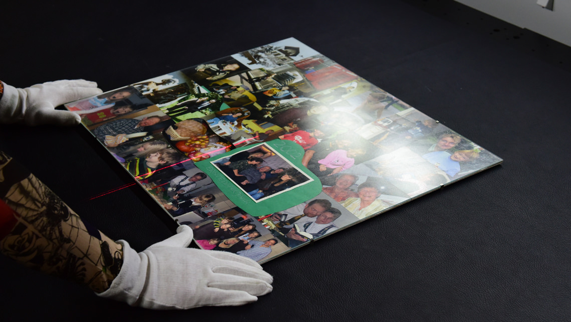 Scan photo collection behind glass